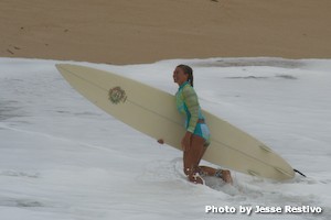 Stoked wahine coming in after a session at Waimea Bay.